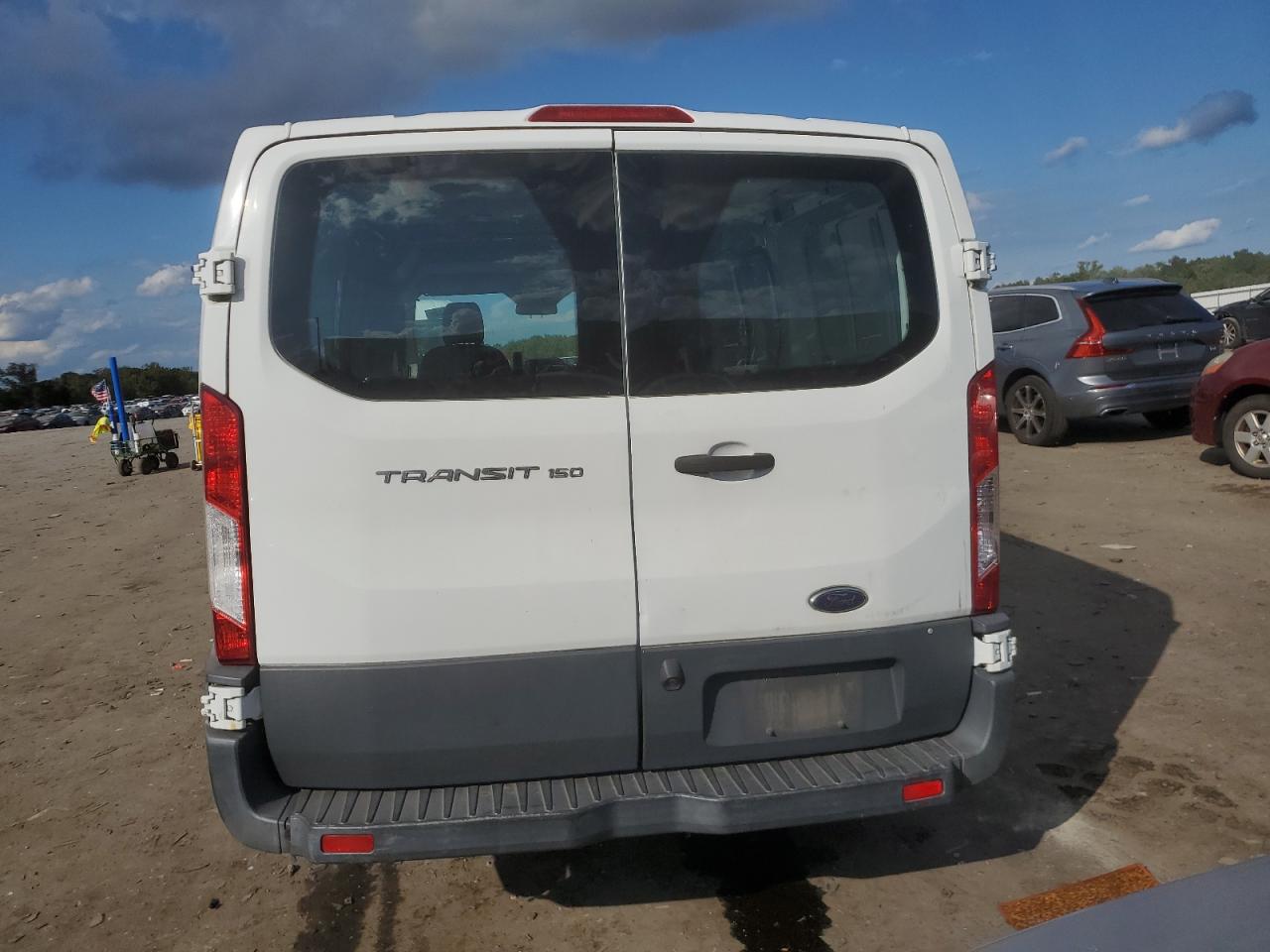 2016 Ford Transit T-150 VIN: 1FTYE1ZM9GKB27599 Lot: 80208485