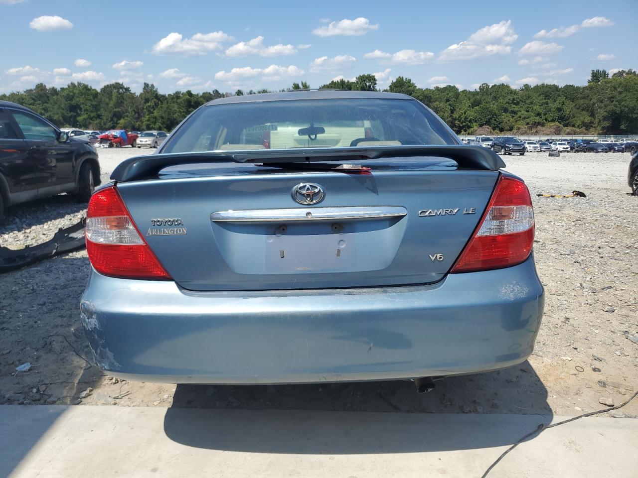 2004 Toyota Camry Le VIN: 4T1BF32KX4U570301 Lot: 71390505