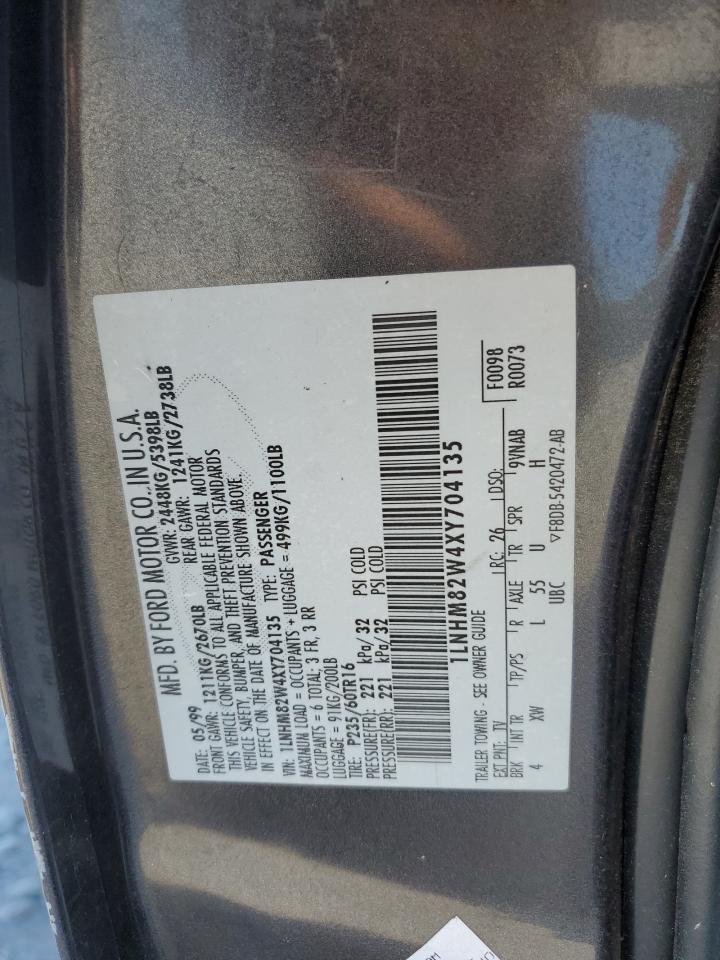 1999 Lincoln Town Car Signature VIN: 1LNHM82W4XY704135 Lot: 84196655