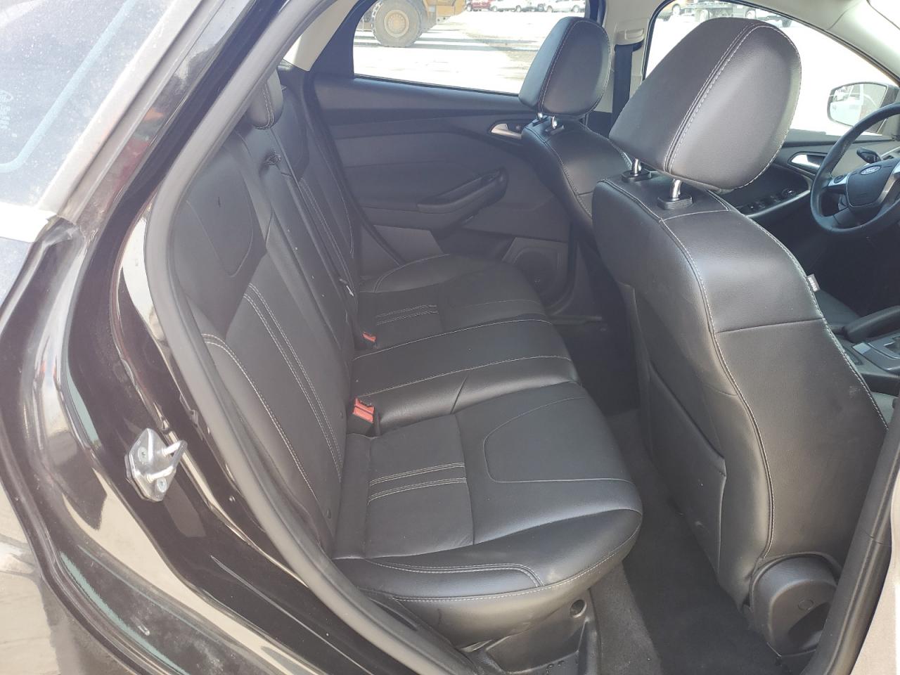 2014 Ford Focus Titanium VIN: 1FADP3N28EL458678 Lot: 81481595