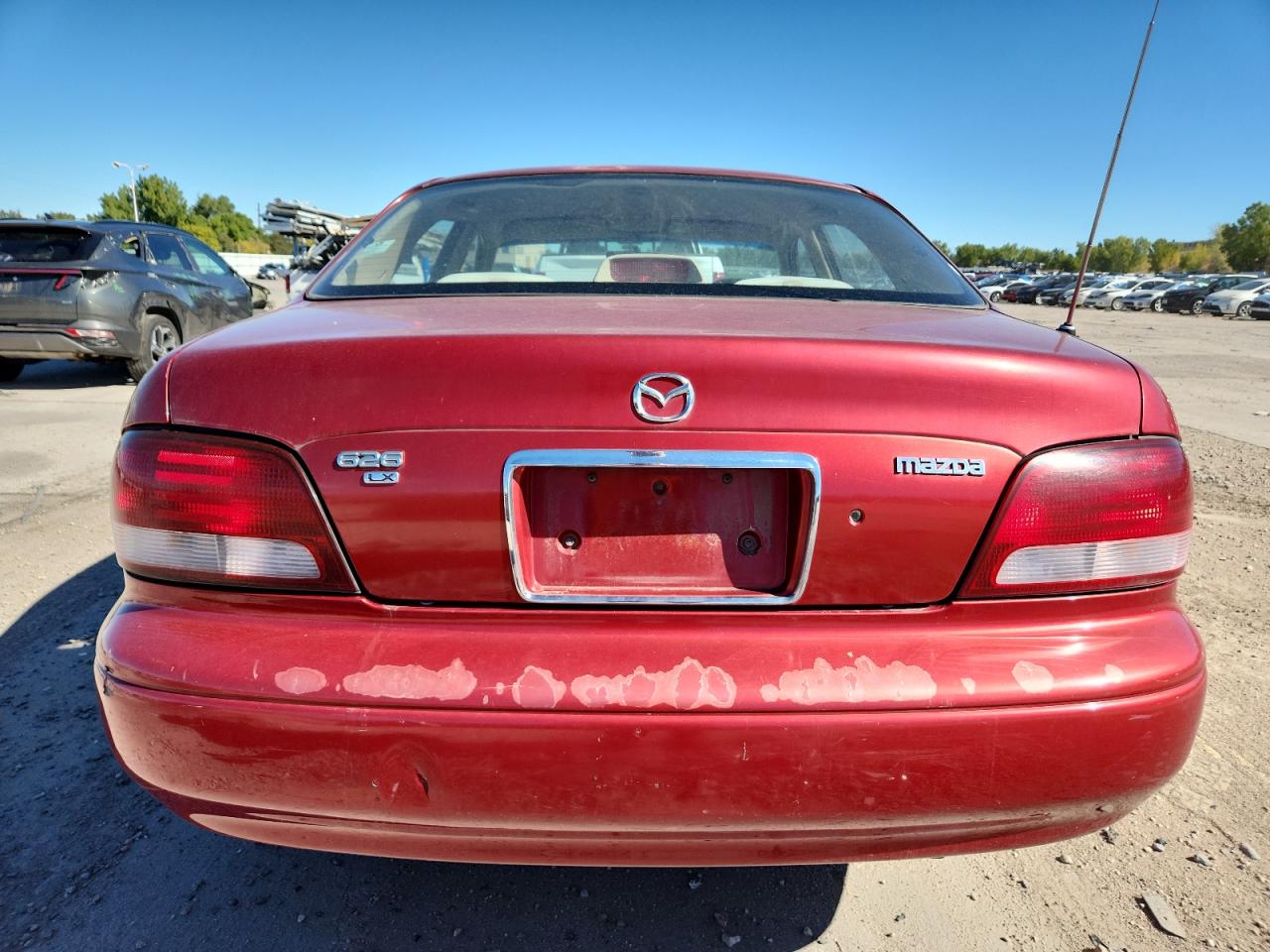 1999 Mazda 626 Es VIN: 1YVGF22C9X5825350 Lot: 84219575