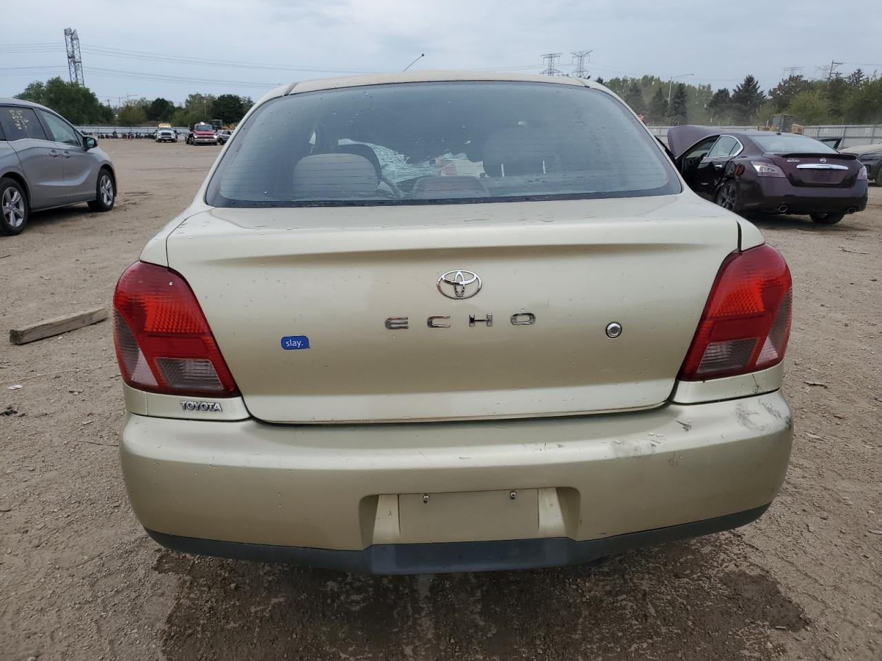 2001 Toyota Echo VIN: JTDBT123910165785 Lot: 81448225