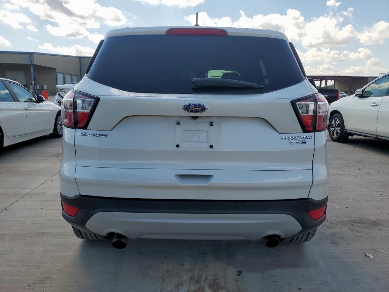 2017 Ford Escape Titanium VIN: 1FMCU9J91HUD60252 Lot: 83794735
