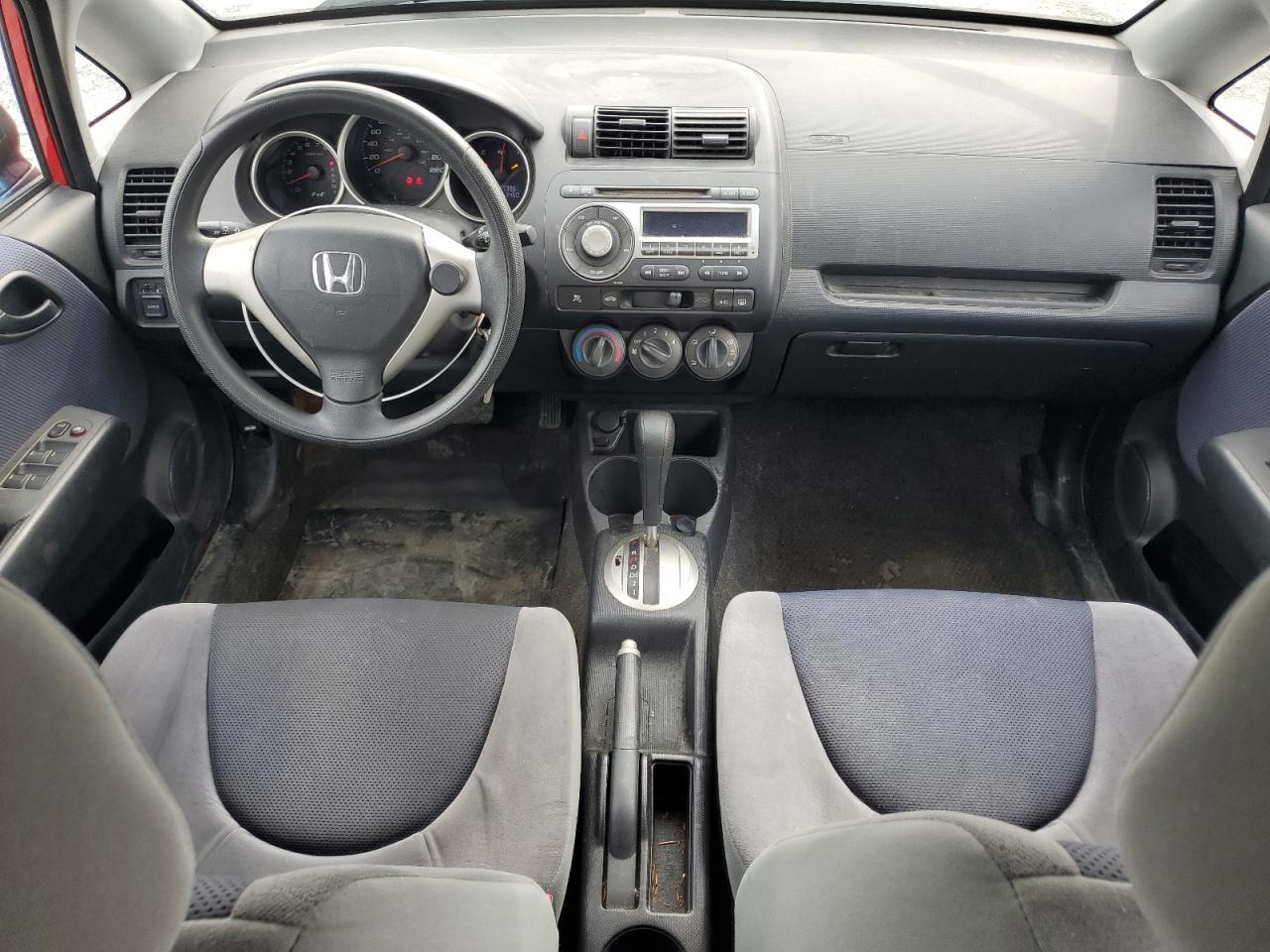 2007 Honda Fit VIN: JHMGD38487S806323 Lot: 80197345