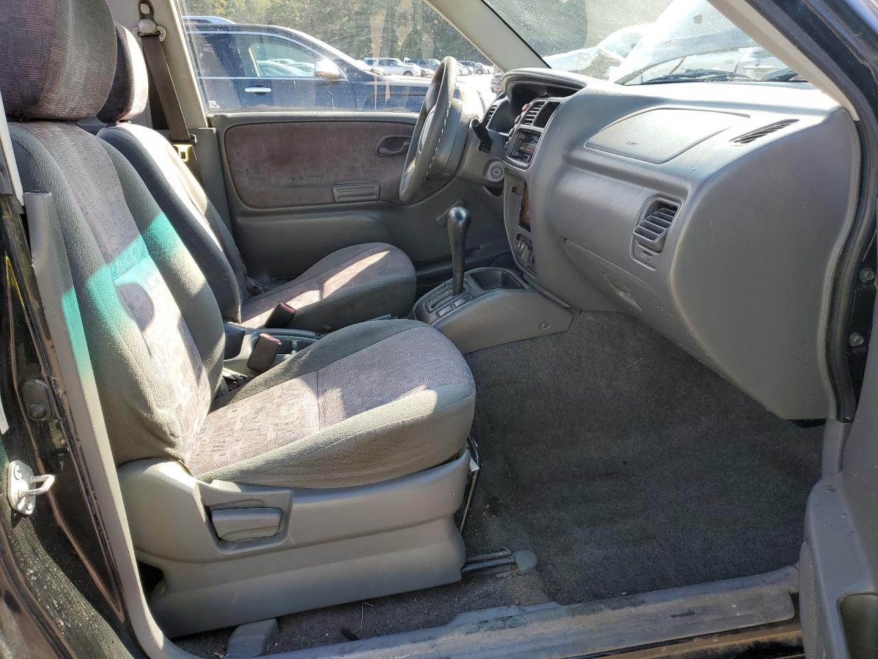 1999 Chevrolet Tracker VIN: 2CNBE18C4X6938322 Lot: 83774925