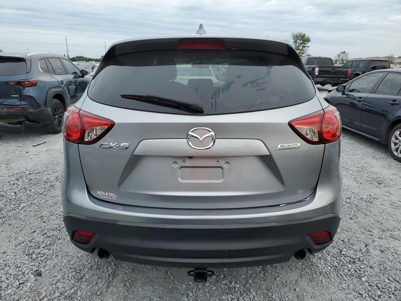 2014 Mazda Cx-5 Touring VIN: JM3KE2CY0E0383735 Lot: 80430875