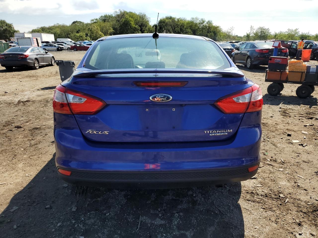 2013 Ford Focus Titanium VIN: 1FADP3J21DL255104 Lot: 84419155