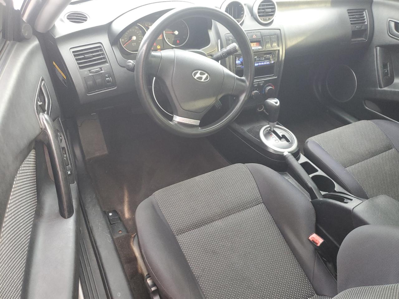 2005 Hyundai Tiburon VIN: KMHHM65D35U184724 Lot: 84444495