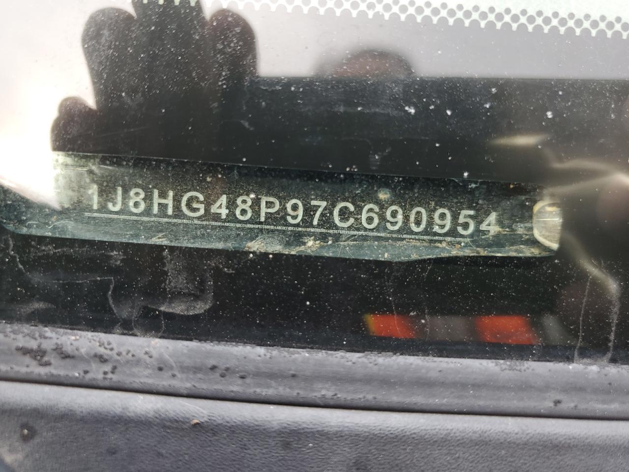 2007 Jeep Commander VIN: 1J8HG48P97C690954 Lot: 70815715