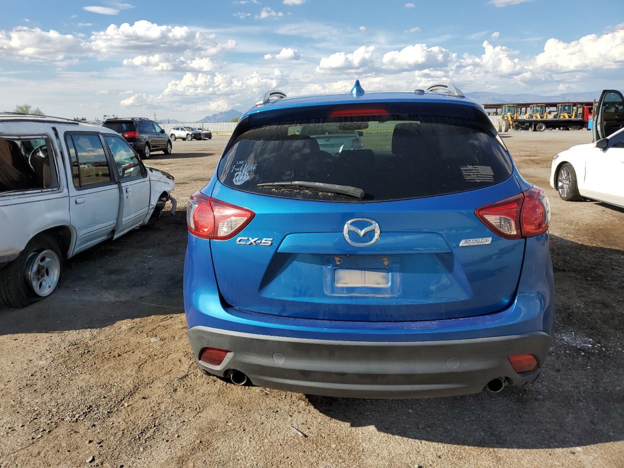 2014 Mazda Cx-5 Touring VIN: JM3KE2CY8E0306062 Lot: 81560065