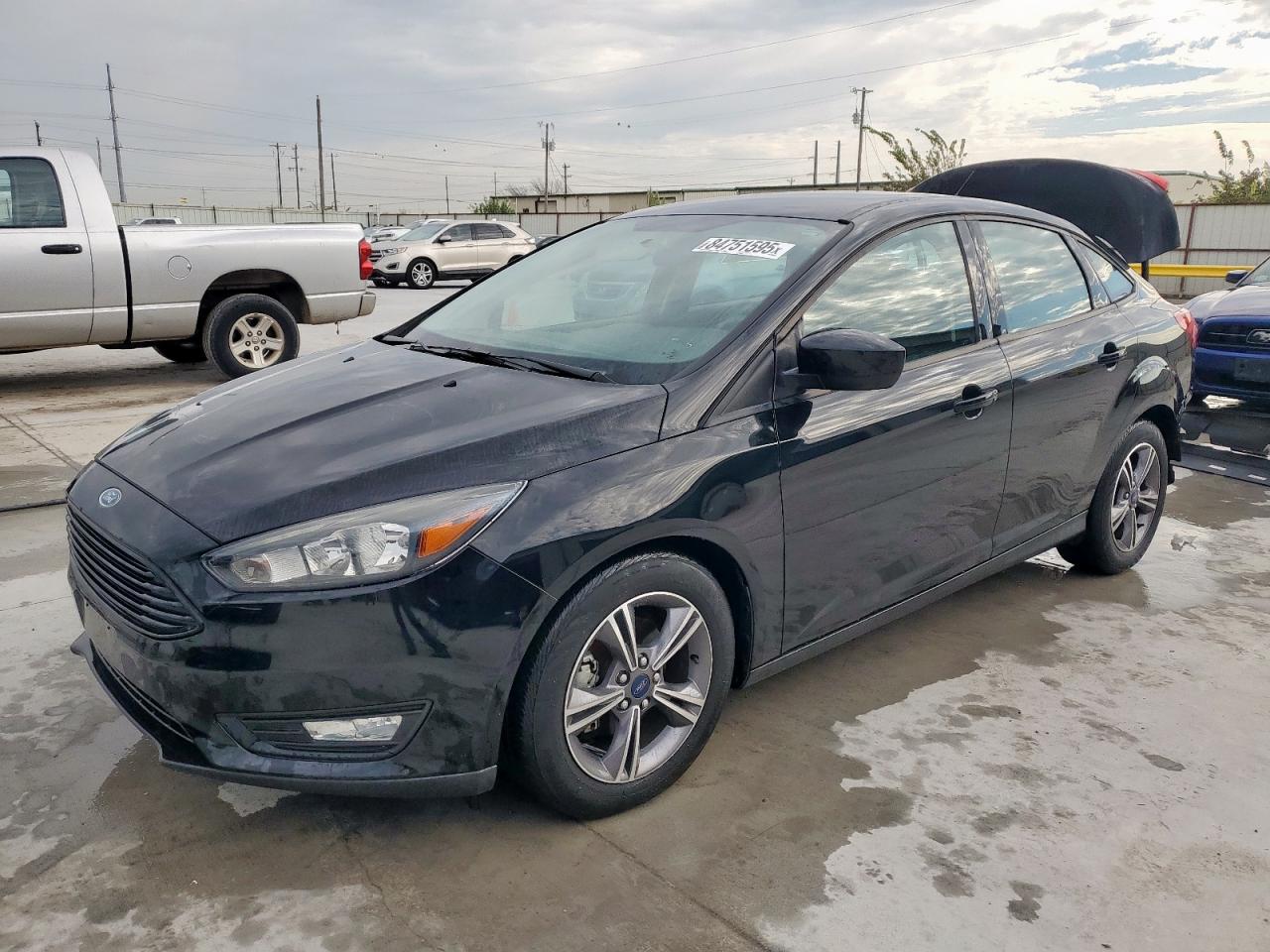 FORD FOCUS 2018. Lot# 84751595. VIN 1FADP3FE2JL292645. Photo 1