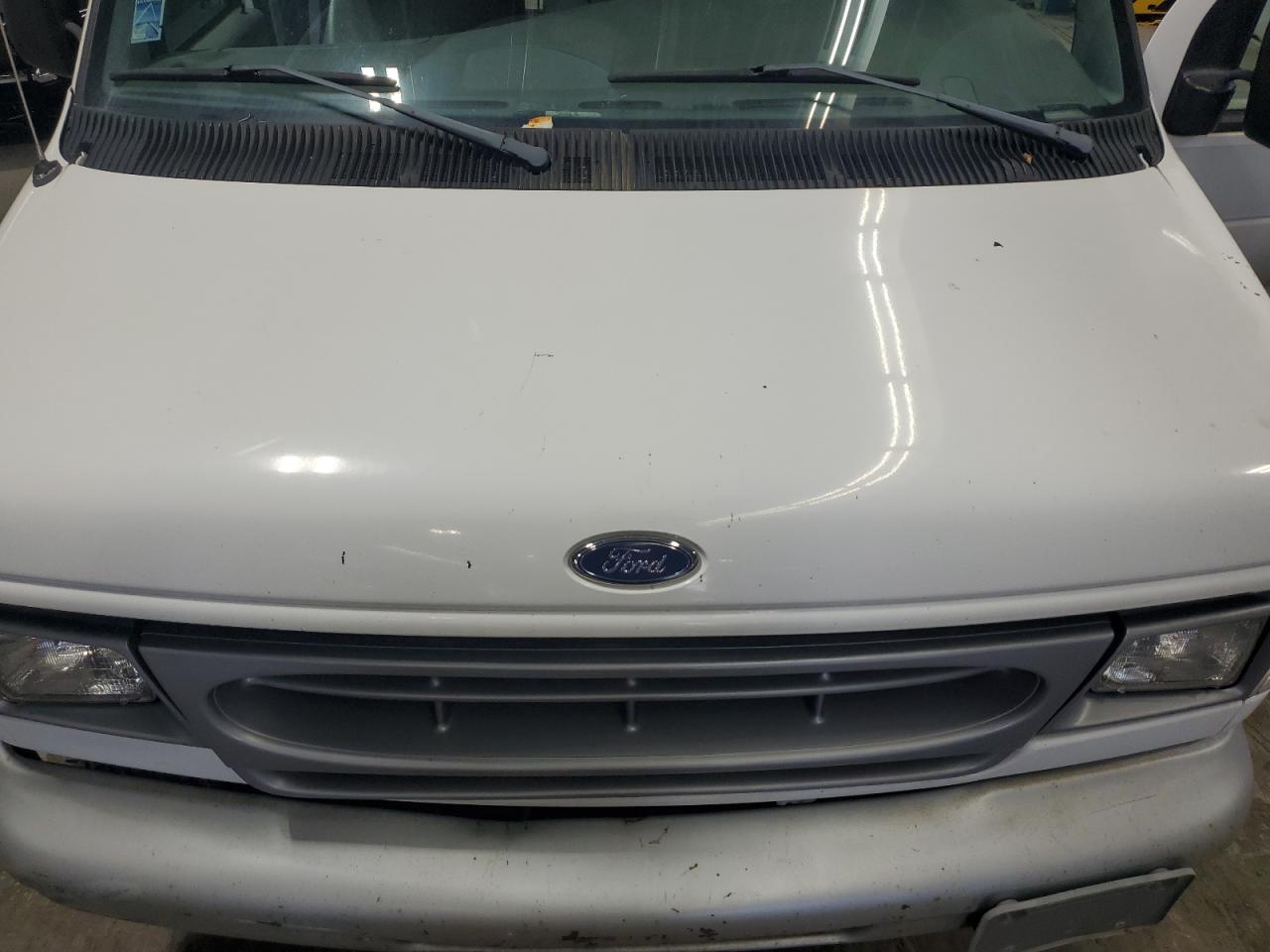 1999 Ford Econoline E350 Super Duty Van VIN: 1FTSE34L8XHA31718 Lot: 69950885