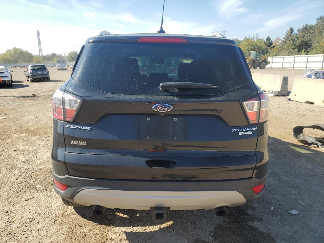 2018 Ford Escape Titanium VIN: 1FMCU0J95JUD01304 Lot: 84648325