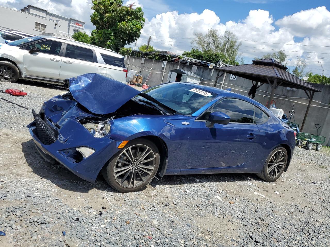 TOYOTA SCION 2013. Lot# 81036235. VIN JF1ZNAA14D2734114. Photo 1