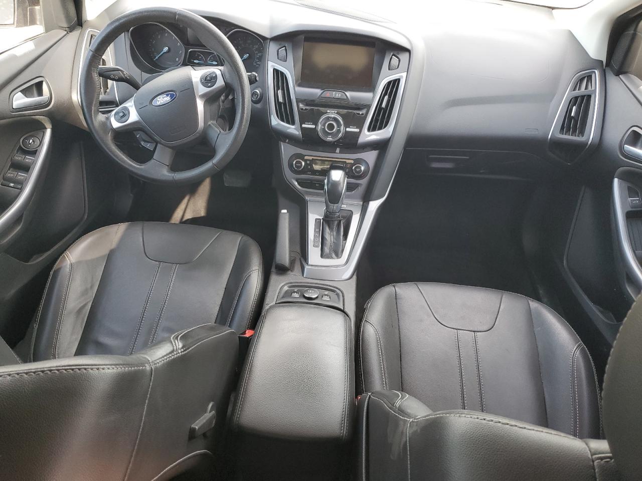 2014 Ford Focus Titanium VIN: 1FADP3N28EL458678 Lot: 81481595