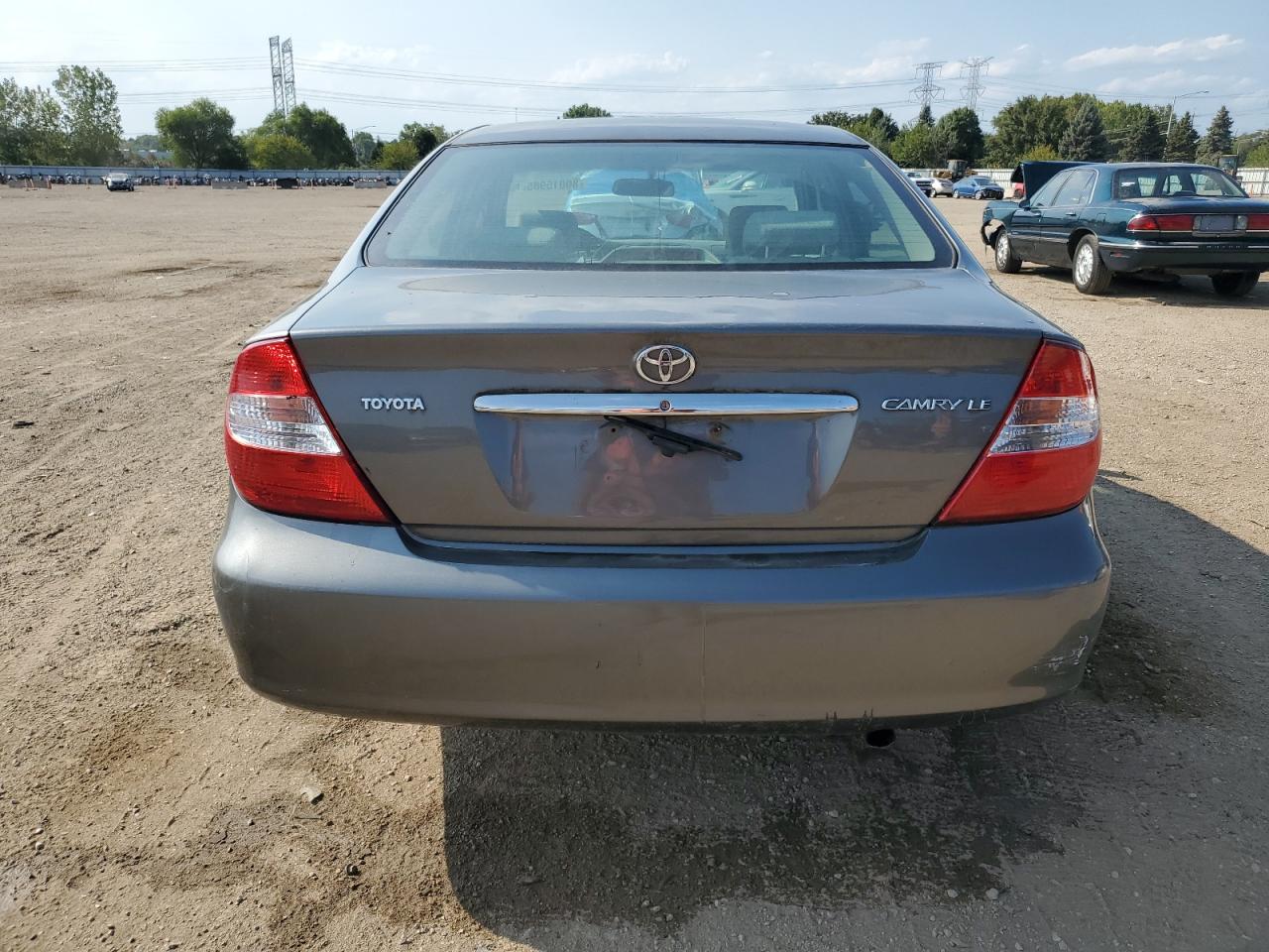 2004 Toyota Camry Le VIN: 4T1BE32KX4U889801 Lot: 80015985