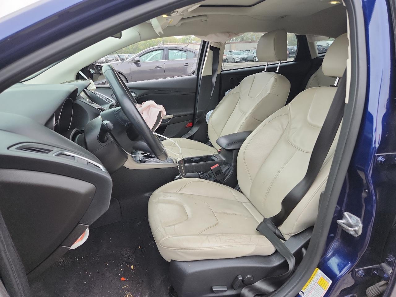 2016 Ford Focus Titanium VIN: 1FADP3N21GL321553 Lot: 81712795