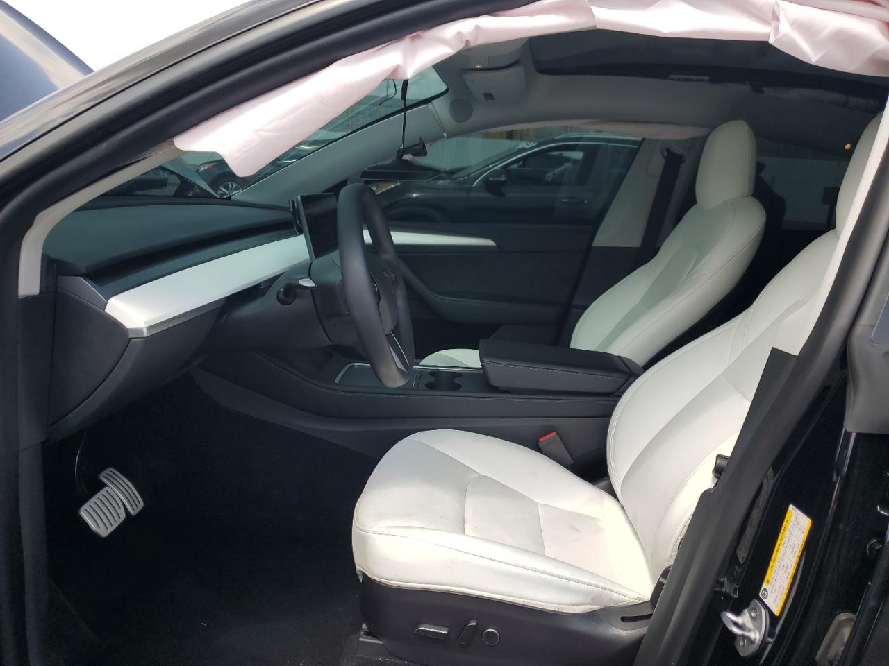 2023 Tesla Model Y VIN: 7SAYGDEF4PF584579 Lot: 80380635