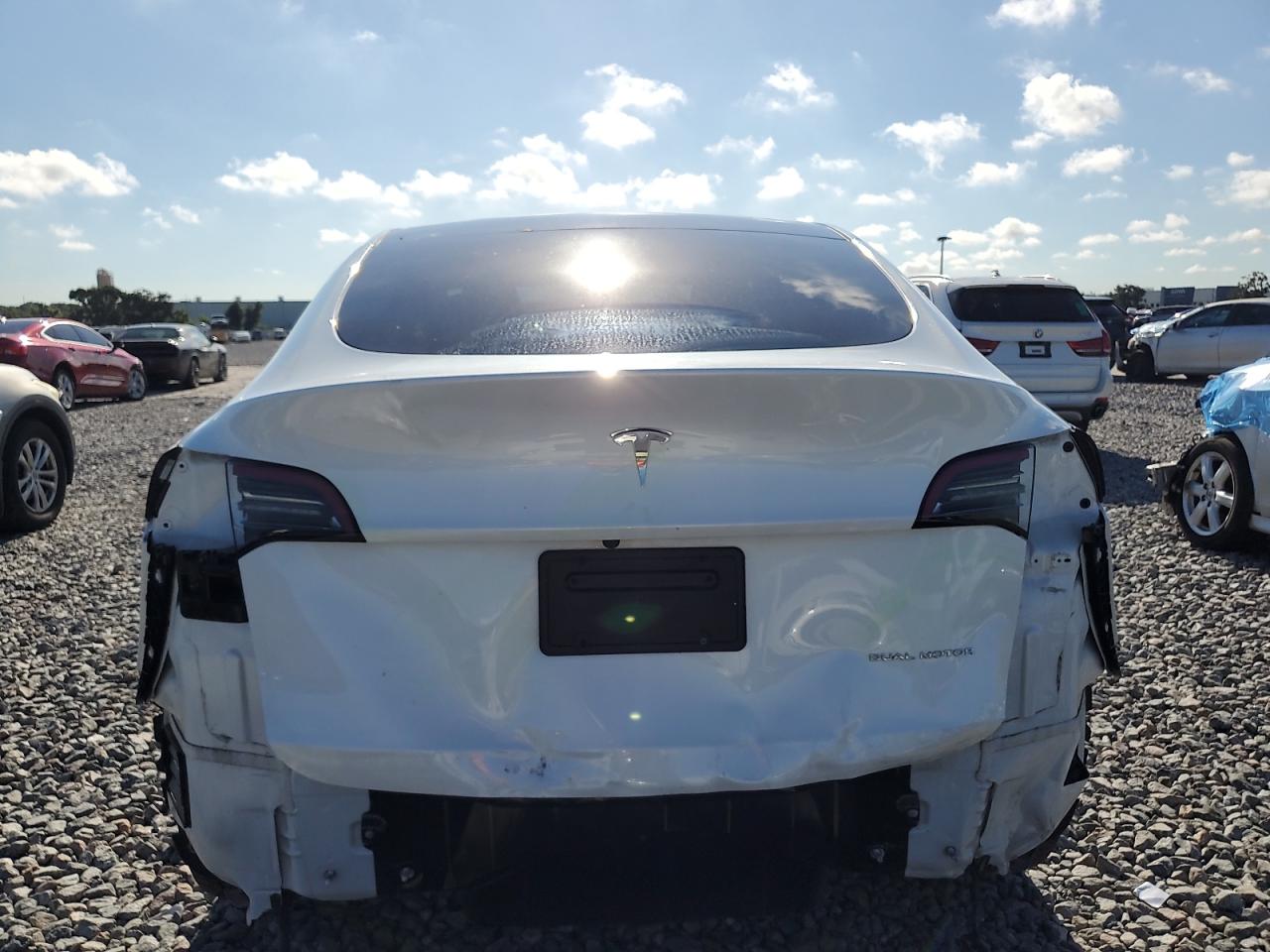 2023 Tesla Model Y VIN: 7SAYGDEE8PA069461 Lot: 82057605