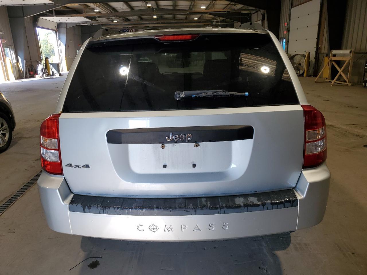 2009 Jeep Compass Sport VIN: 1J4FF47B39D201169 Lot: 80141555