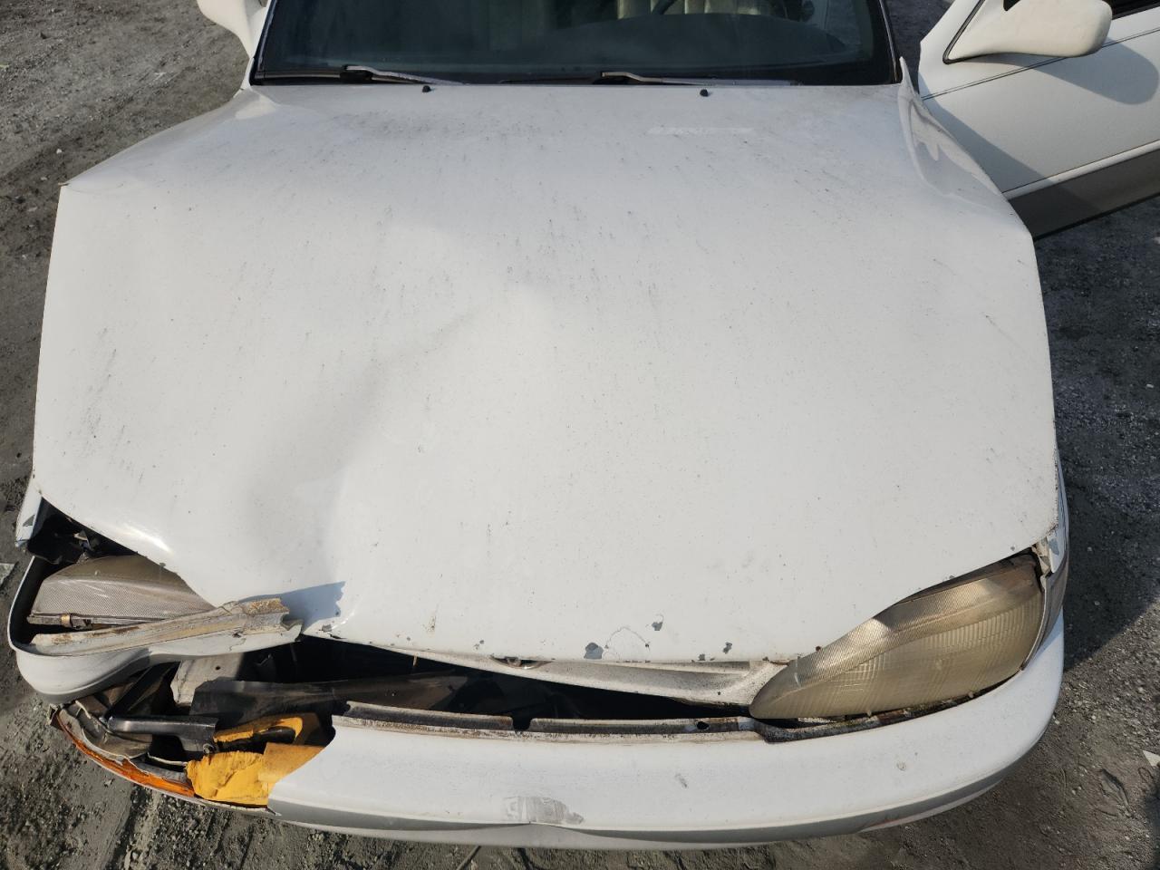 1995 Toyota Camry Le VIN: 4T1SK12C7SU609495 Lot: 81212095