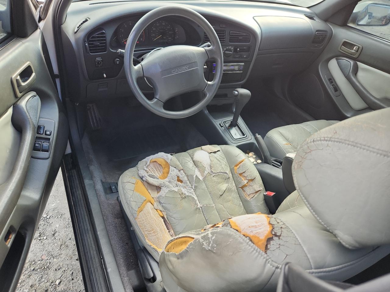 1995 Toyota Camry Le VIN: 4T1SK12C7SU609495 Lot: 81212095