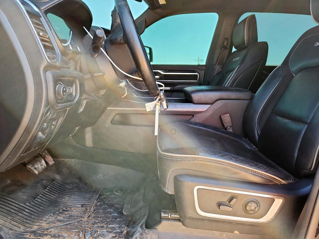 2021 Ram 1500 Laramie VIN: 1C6SRFJT8MN778136 Lot: 84003125