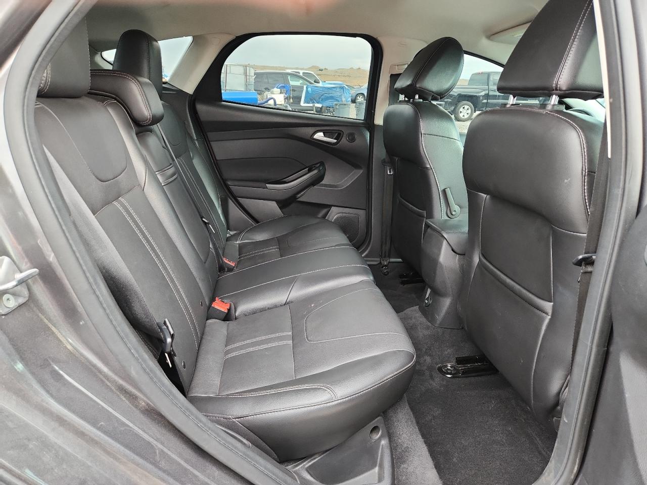 2012 Ford Focus Titanium VIN: 1FAHP3N24CL389826 Lot: 82101595