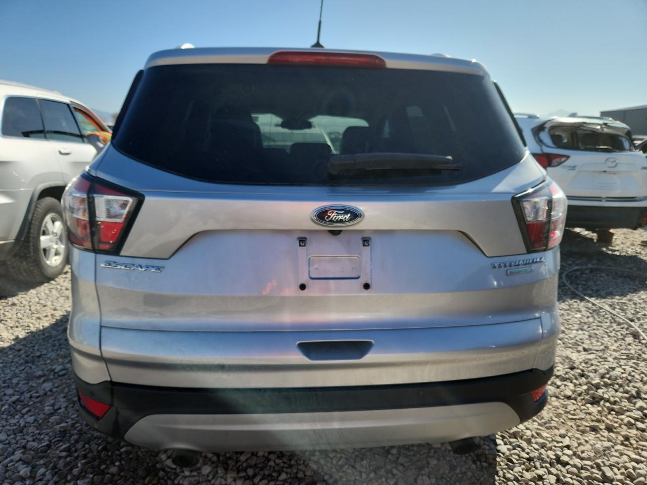 2017 Ford Escape Titanium VIN: 1FMCU0JD4HUE06057 Lot: 80570685