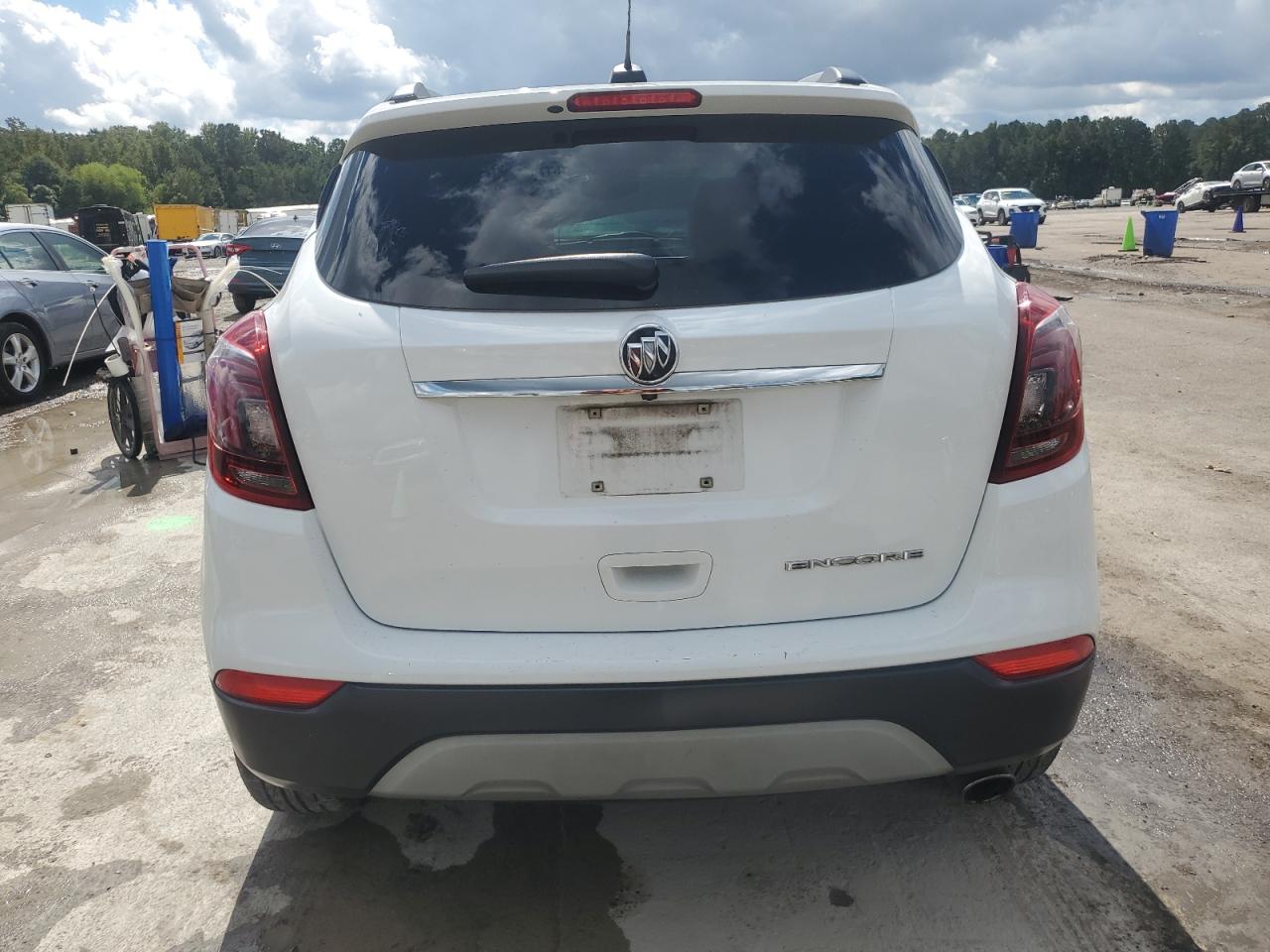 2019 Buick Encore Essence VIN: KL4CJCSM9KB899406 Lot: 81764665