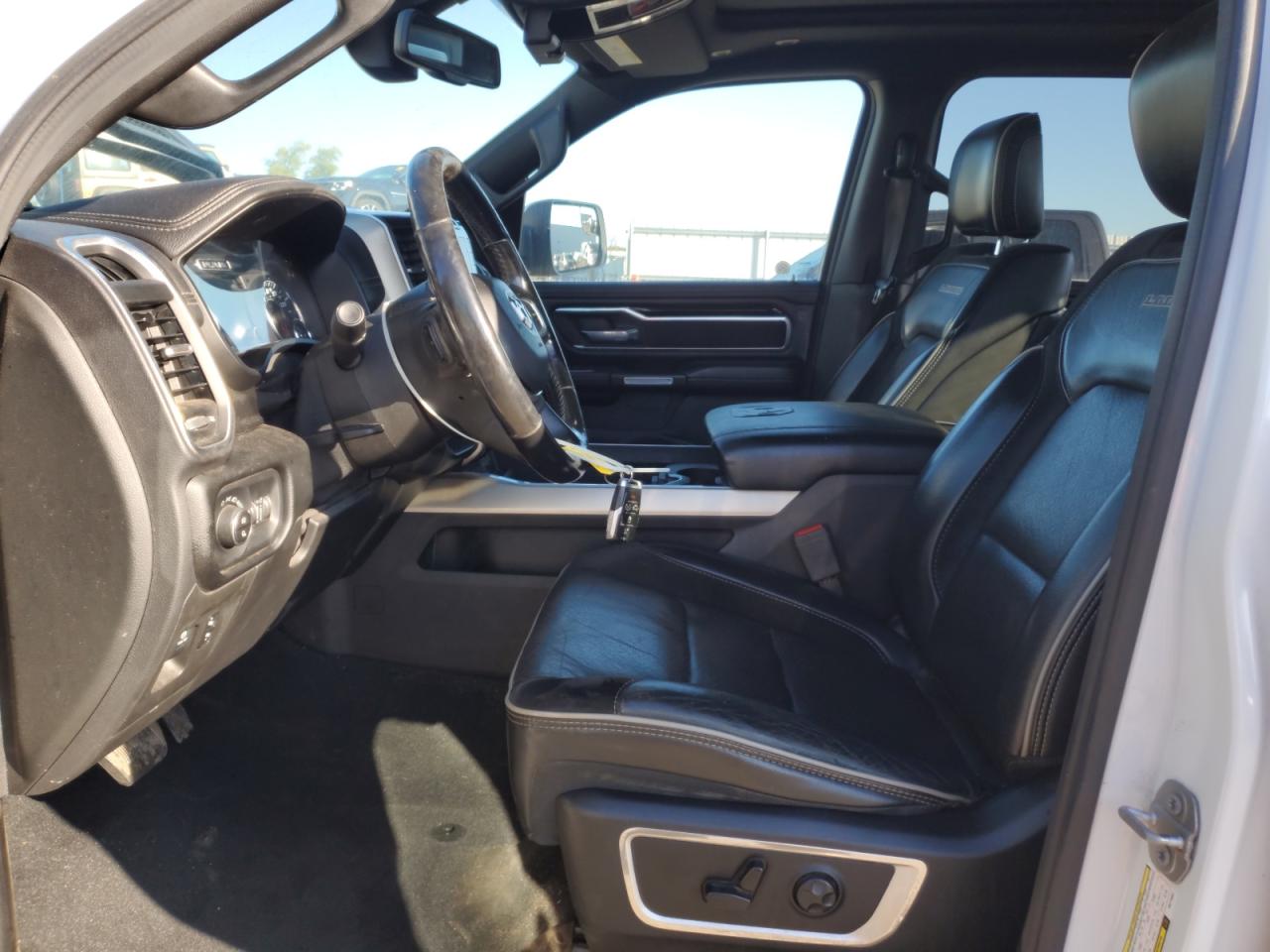 2019 Ram 1500 Laramie VIN: 1C6SRFJT7KN715557 Lot: 81608595