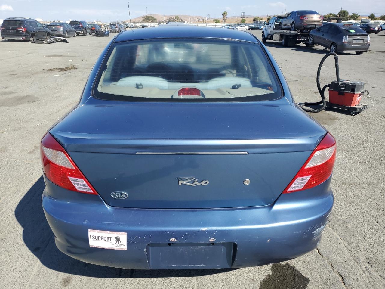 2001 Kia Rio VIN: KNADC123316063031 Lot: 81620495