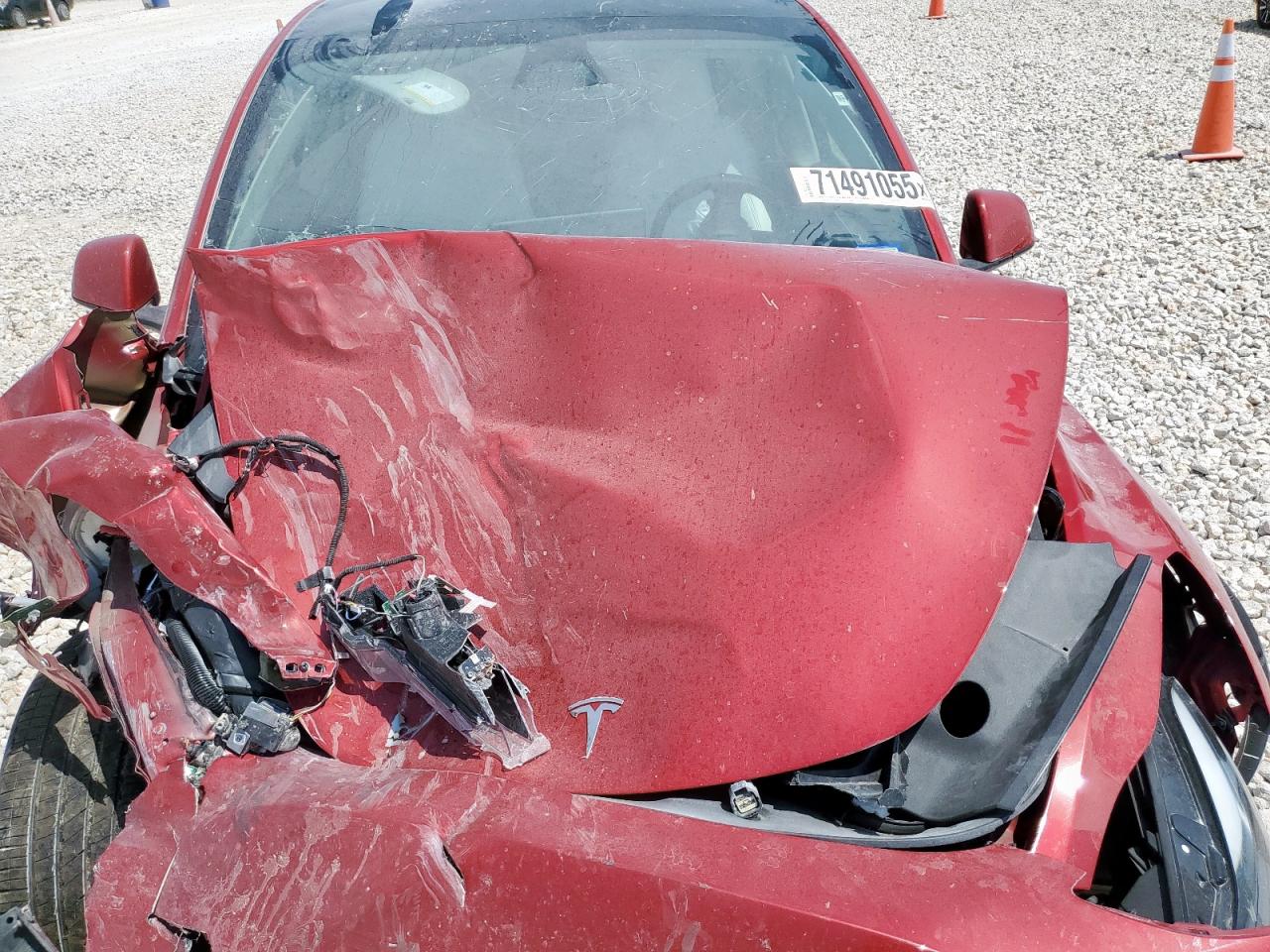 2023 Tesla Model Y VIN: 7SAYGAEE2PF890718 Lot: 71491055