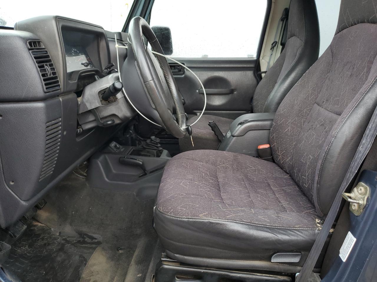 2002 Jeep Wrangler / Tj Sport VIN: 1J4FA49S22P715529 Lot: 80557755