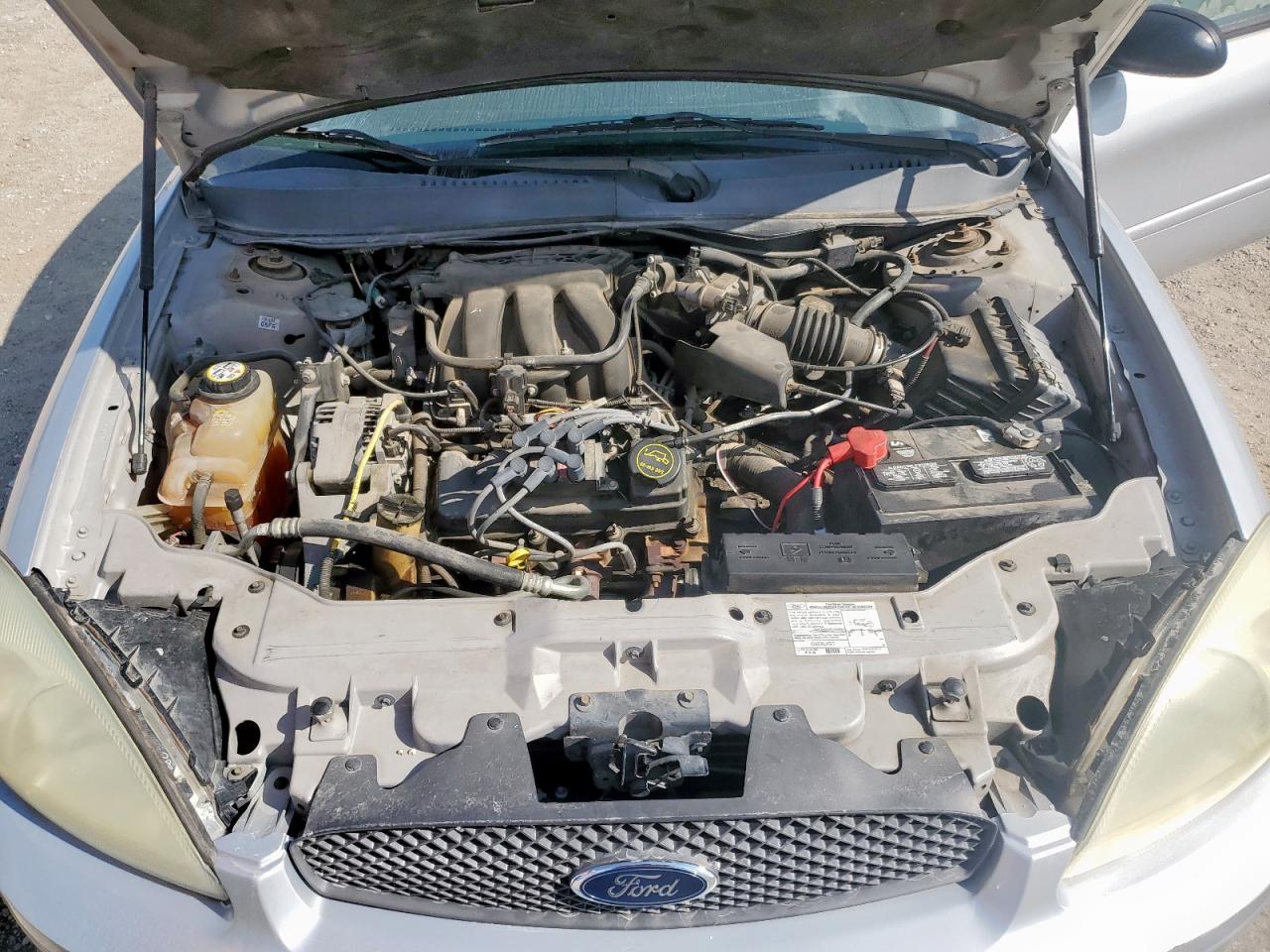 2007 Ford Taurus Se VIN: 1FAFP53U07A121672 Lot: 84804925