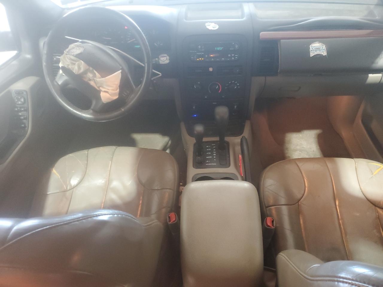 1999 Jeep Grand Cherokee Laredo VIN: 1J4GW58S2XC765424 Lot: 71172935