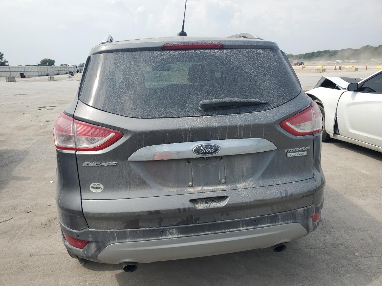 2014 Ford Escape Titanium VIN: 1FMCU0JX4EUC06060 Lot: 80853575