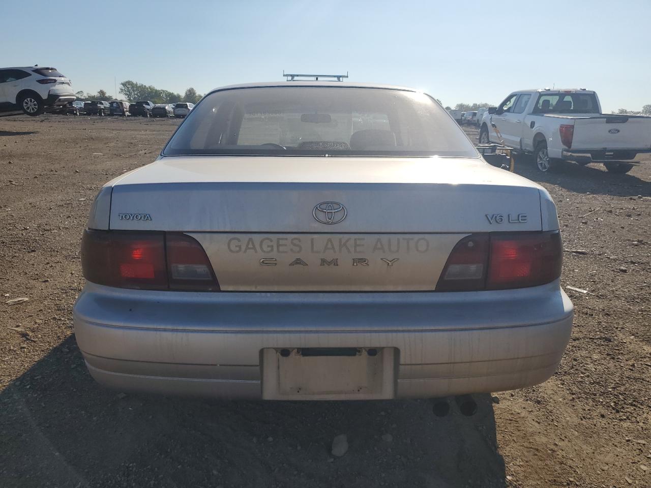 1995 Toyota Camry Le VIN: 4T1GK12E9SU100869 Lot: 80628715