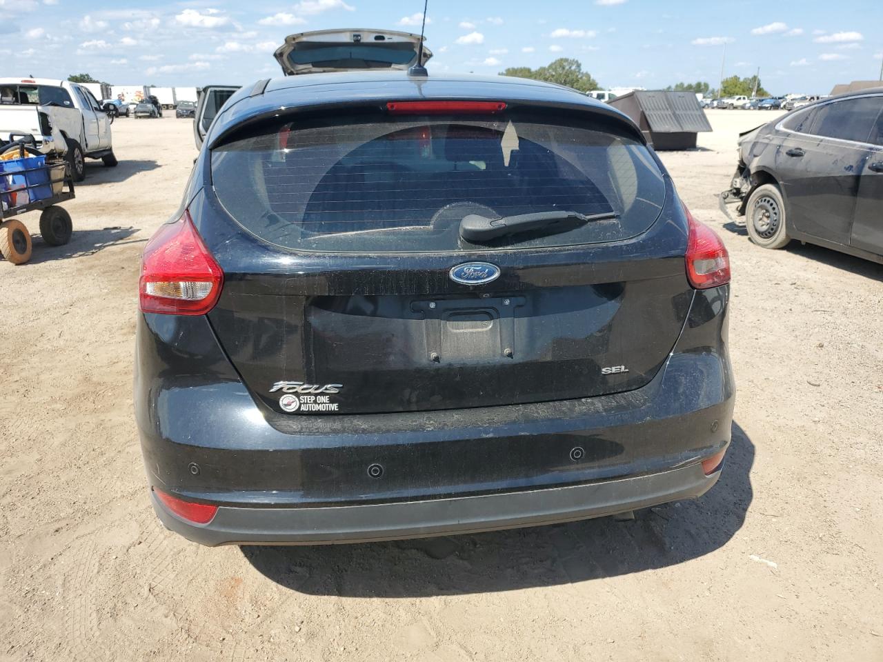2017 Ford Focus Sel VIN: 1FADP3M2XHL314605 Lot: 83896005