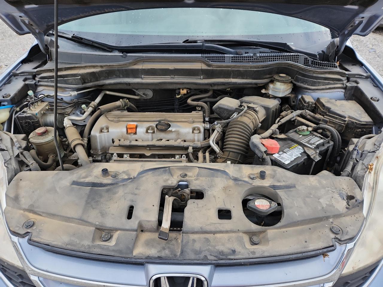 2010 Honda Cr-V Exl VIN: JHLRE4H79AC002303 Lot: 81606895