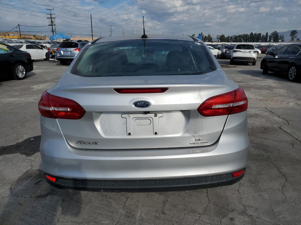 2016 Ford Focus Se VIN: 1FADP3F21GL202268 Lot: 83858885