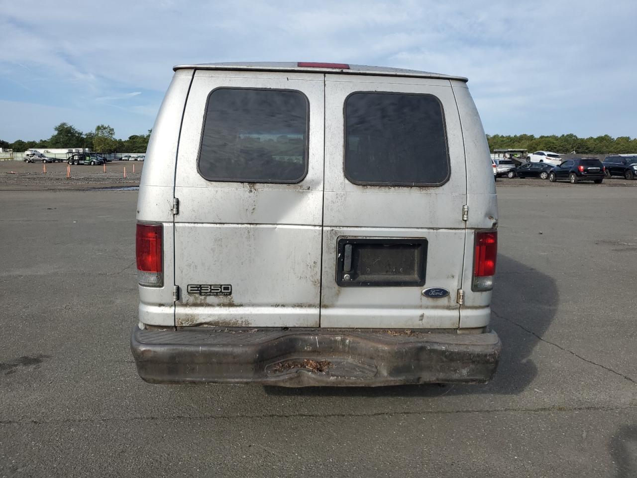 2005 Ford Econoline E350 Super Duty Van VIN: 1FTSE34L75HA84648 Lot: 83757135