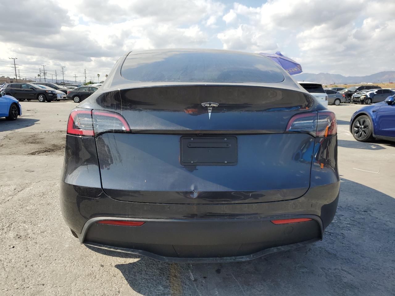 2025 Tesla Model Y VIN: 7SAYGDED7SF218400 Lot: 72071165
