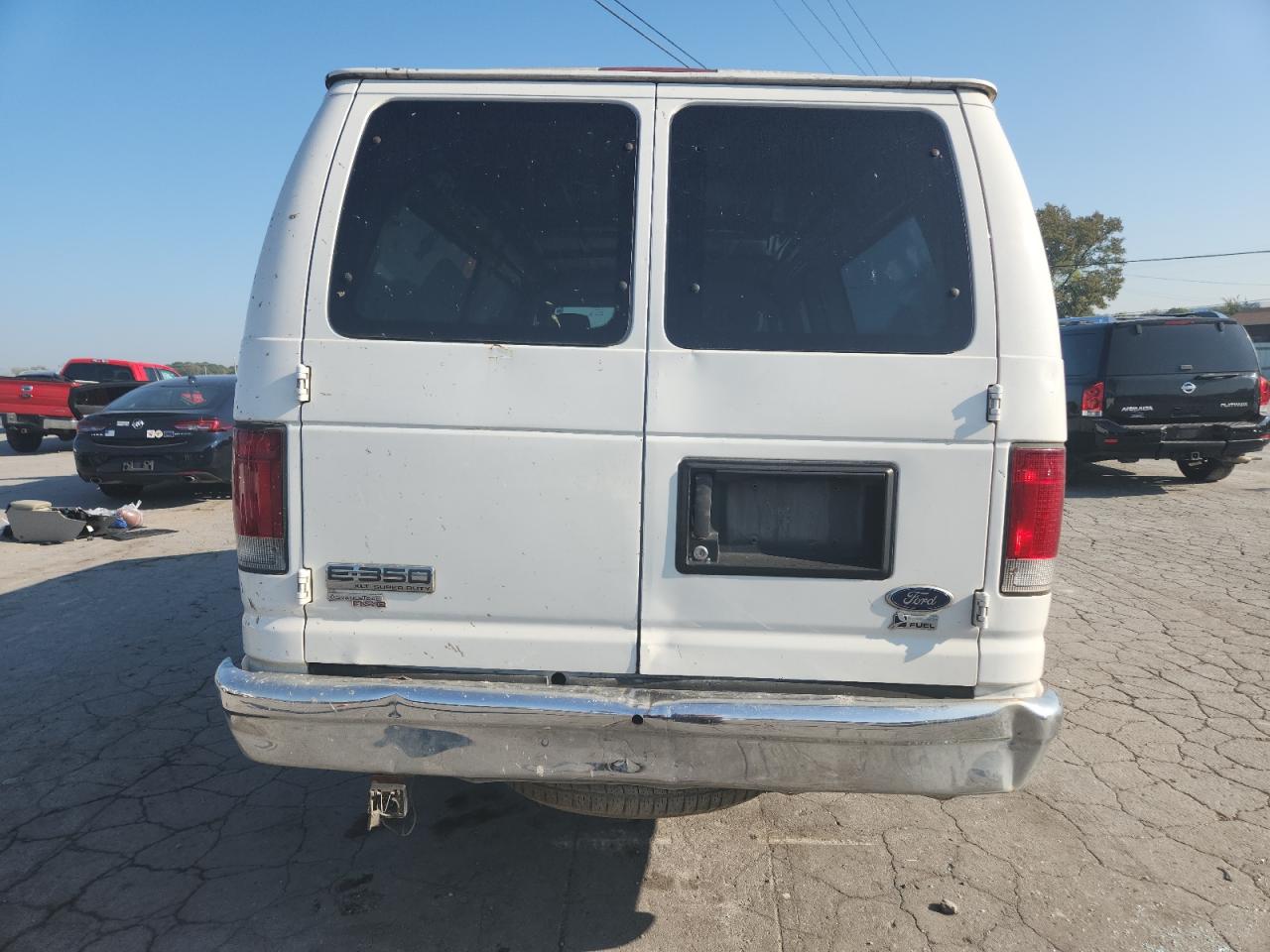 2009 Ford Econoline E350 Super Duty Wagon VIN: 1FBSS31L09DA13466 Lot: 81419255