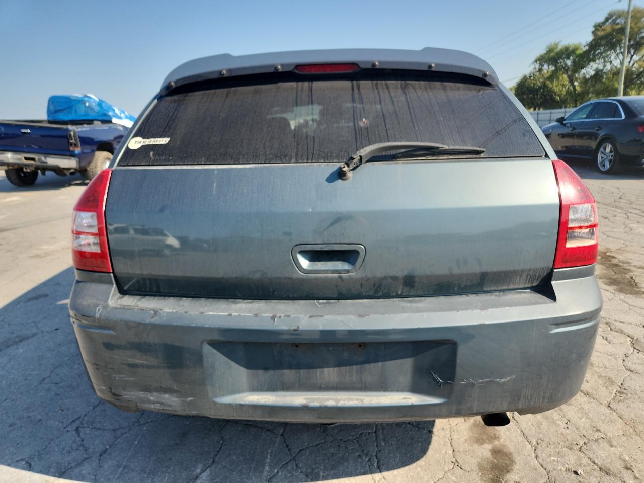 2005 Dodge Magnum Sxt VIN: 2D4FV48V35H570230 Lot: 80493115