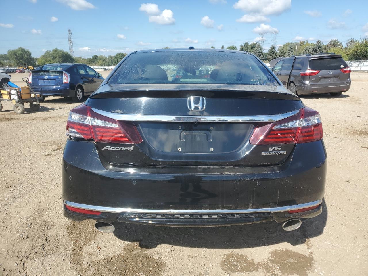 2017 Honda Accord Touring VIN: 1HGCR3F94HA003856 Lot: 82158625