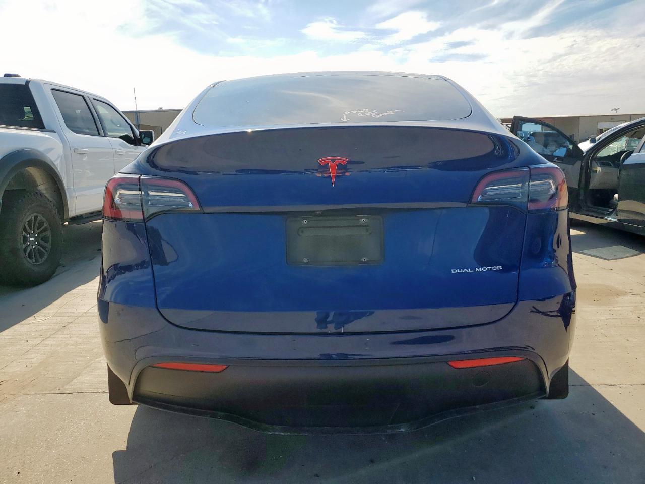 2023 Tesla Model Y VIN: 7SAYGDEE9PA097155 Lot: 84566845