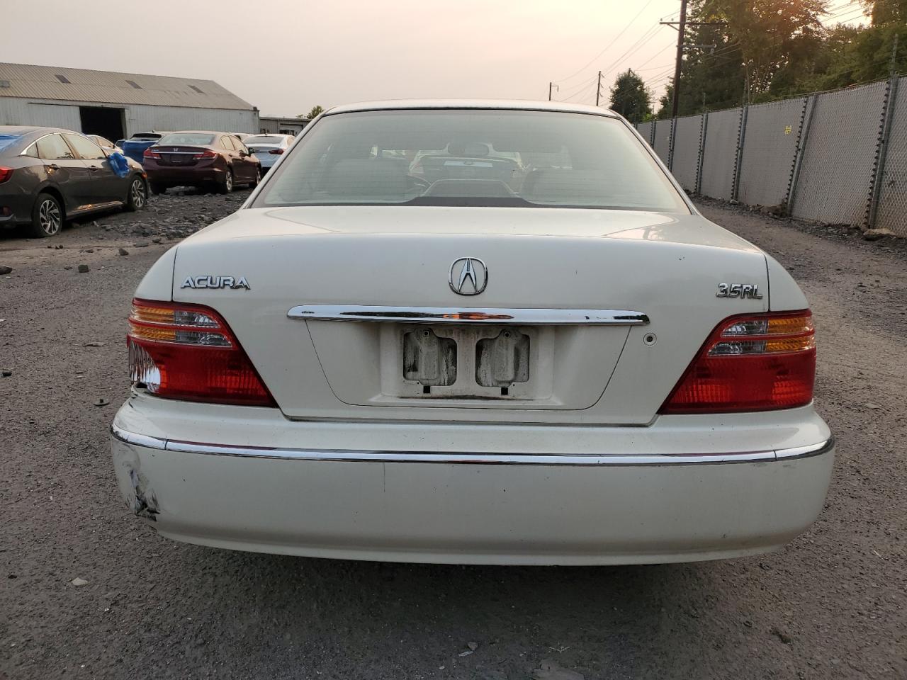 1999 Acura 3.5Rl VIN: JH4KA9650XC006689 Lot: 71615065