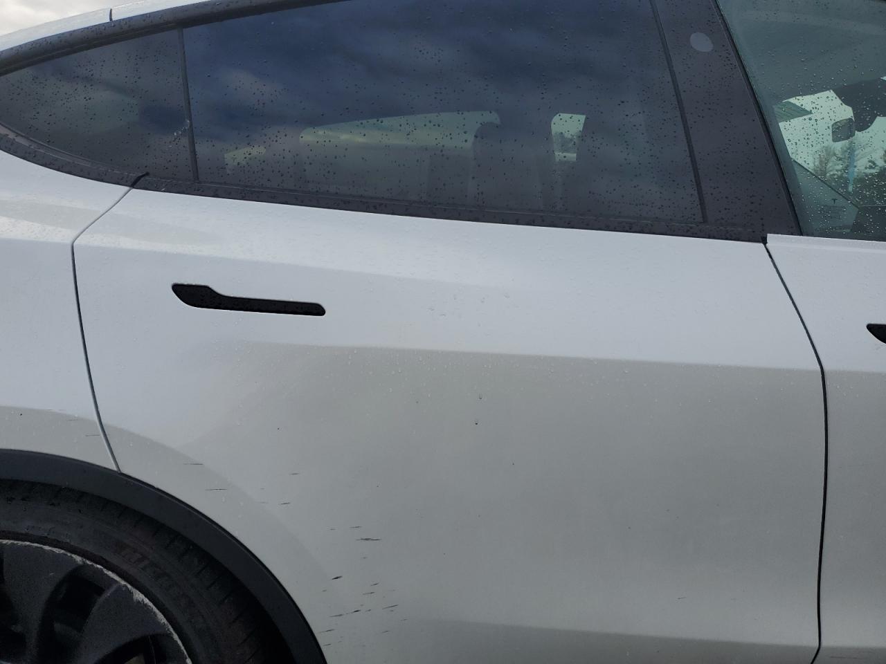 2023 Tesla Model Y VIN: 7SAYGDEF9PF897076 Lot: 71784135