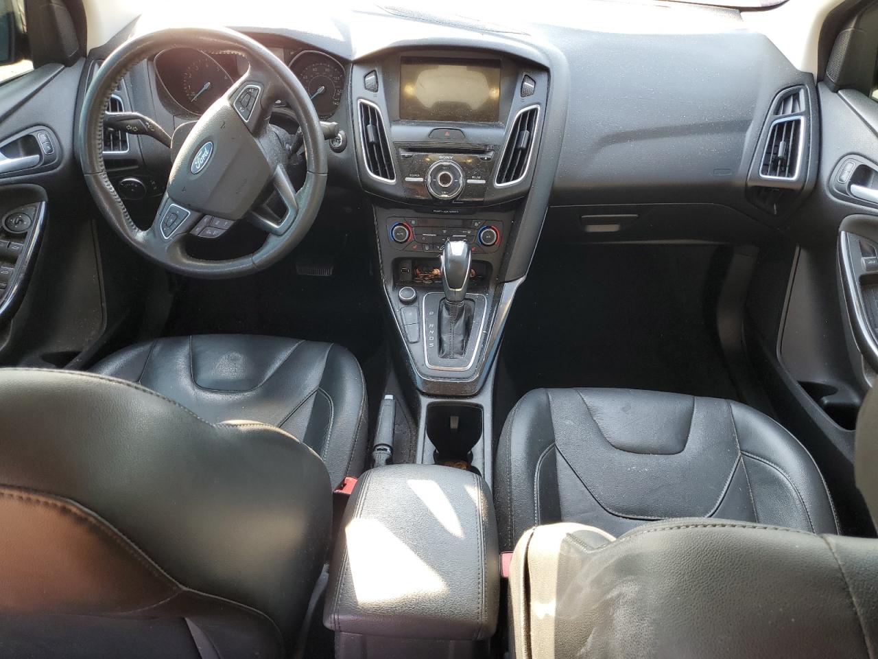 2017 Ford Focus Titanium VIN: 1FADP3J26HL222864 Lot: 84170915